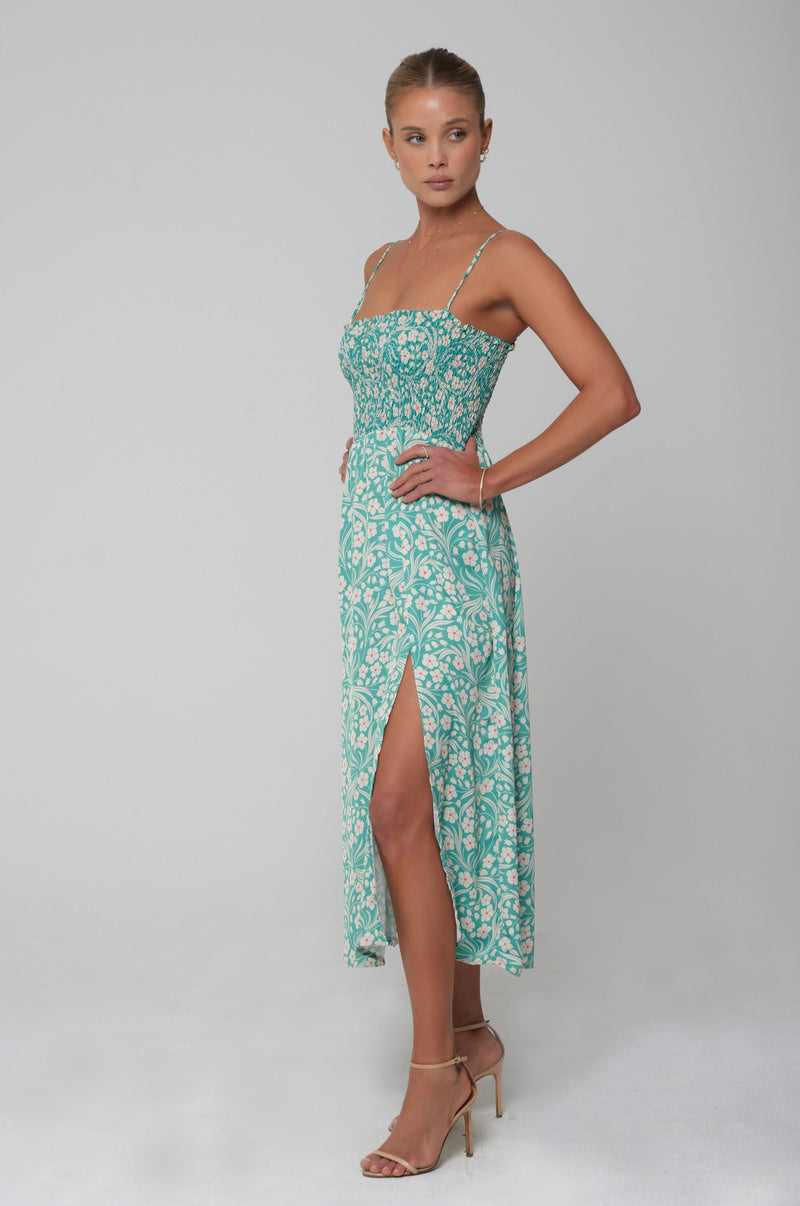 This is an image of Ashley Midi in Maldives - RESA featuring a model wearing the dress