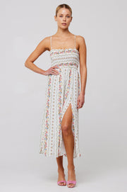 This is an image of Ashley Midi in Midsummer - RESA featuring a model wearing the dress