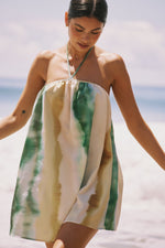 This is an image of Belle Dress in Gaia - RESA featuring a model wearing the dress