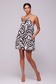 This is an image of Belle Dress in Tigris - RESA featuring a model wearing the dress