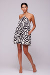 This is an image of Belle Dress in Tigris - RESA featuring a model wearing the dress