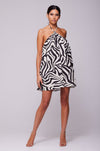 This is an image of Belle Dress in Tigris - RESA featuring a model wearing the dress