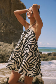 This is an image of Belle Dress in Tigris - RESA featuring a model wearing the dress