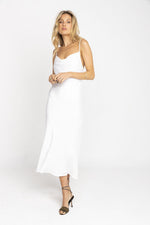 This is an image of Berri Slip - RESA featuring a model wearing the dress
