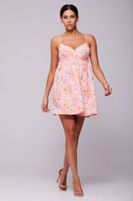 This is an image of Betsy Mini in Jasmine - RESA featuring a model wearing the dress