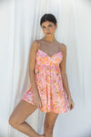 This is an image of Betsy Mini in Jasmine - RESA featuring a model wearing the dress