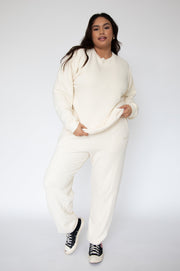 This is an image of Bodhi Sweat pants in Bone - RESA featuring a model wearing the dress