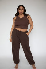 This is an image of Bodhi Sweat pants in Tobacco - RESA featuring a model wearing the dress