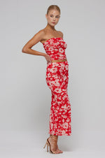 This is an image of Bonnie Mesh Top in Frida - RESA featuring a model wearing the dress