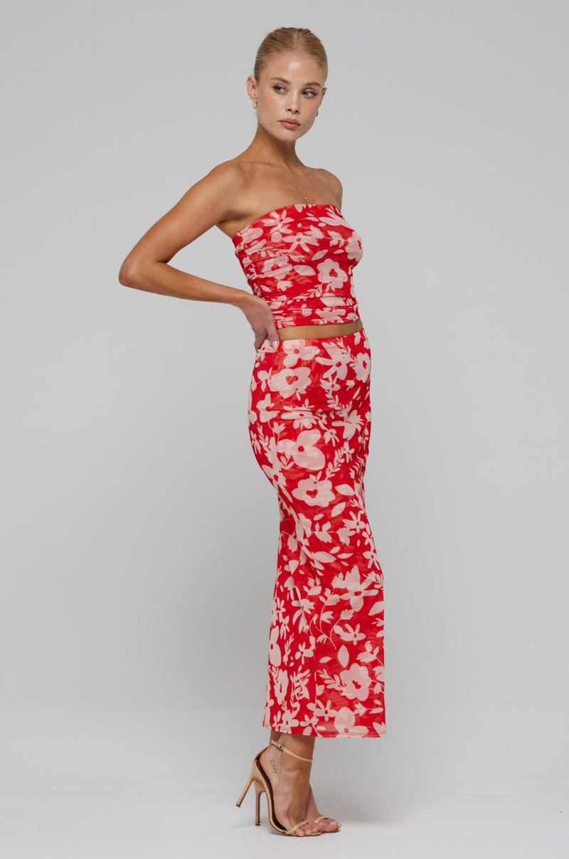 This is an image of Bonnie Mesh Top in Frida - RESA featuring a model wearing the dress