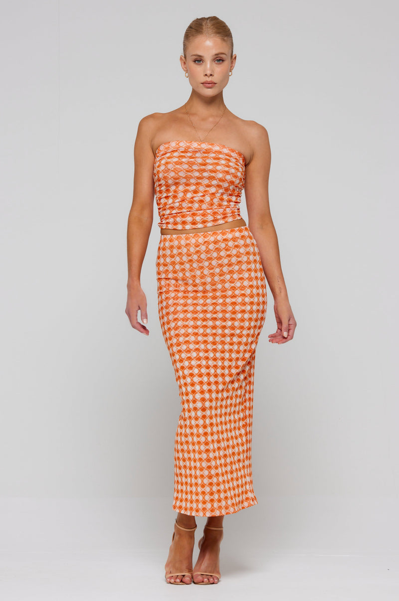 This is an image of Bonnie Mesh Top in Solstice - RESA featuring a model wearing the dress
