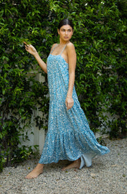 This is an image of Bridget Maxi in Iris - RESA featuring a model wearing the dress