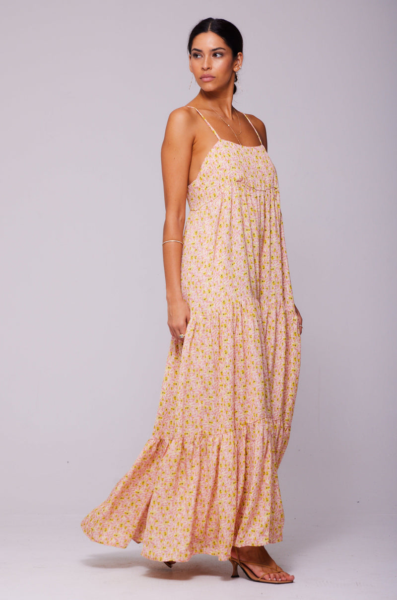This is an image of Bridget Maxi in Laguna - RESA featuring a model wearing the dress