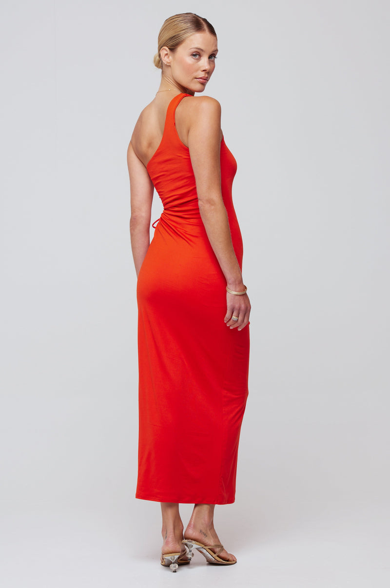 This is an image of Caley Dress in Red - RESA featuring a model wearing the dress