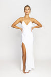 This is an image of Camille Slip Dress - RESA featuring a model wearing the dress