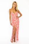 This is an image of Camille Slip Dress in Guava - RESA featuring a model wearing the dress