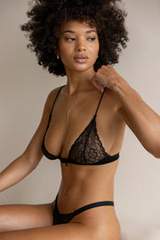 This is an image of Candace Bralette in Black - RESA featuring a model wearing the dress
