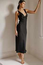 This is an image of Charlie Dress in Black - RESA featuring a model wearing the dress