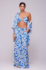 This is an image of Chase Pant in Pacific - RESA featuring a model wearing the dress