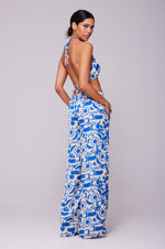This is an image of Chase Pant in Pacific - RESA featuring a model wearing the dress