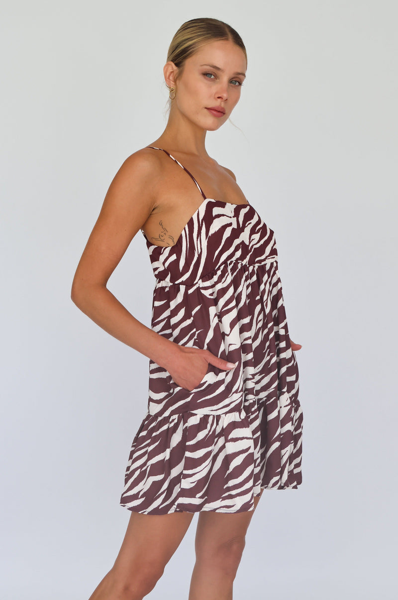This is an image of Chloe Mini in Kona Chocolate Brown - RESA featuring a model wearing the dress