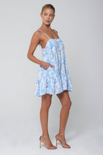 This is an image of Chloe Mini in Malibu - RESA featuring a model wearing the dress
