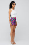 This is an image of Dash Skirt in Candy - RESA featuring a model wearing the dress
