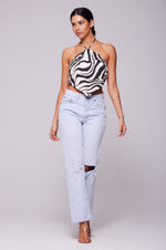 This is an image of Dixie Top in Tigris - RESA featuring a model wearing the dress