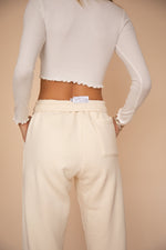 This is an image of Eddy Top in Ivory - RESA featuring a model wearing the dress