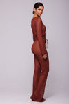 This is an image of Elise Top in Brick - RESA featuring a model wearing the dress