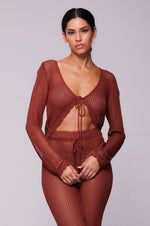 This is an image of Elise Top in Brick - RESA featuring a model wearing the dress