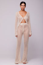 This is an image of Elise Top in Natural - RESA featuring a model wearing the dress