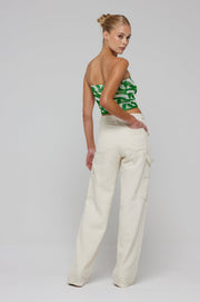 This is an image of Elsa Cargo Pant - RESA featuring a model wearing the dress