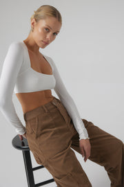 This is an image of Elsa Cargo Pant in Espresso - RESA featuring a model wearing the dress