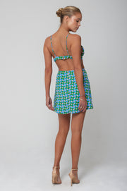 This is an image of Emma Top in Oasis - RESA featuring a model wearing the dress