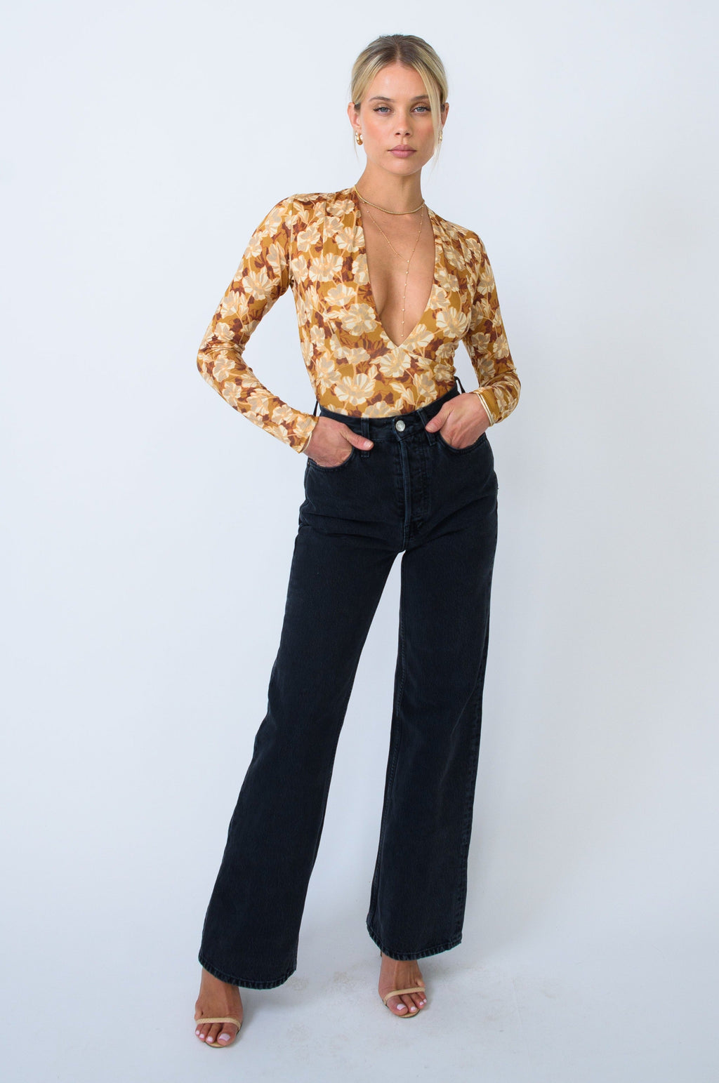 This is an image of Ever Bodysuit in Ashland - RESA featuring a model wearing the dress