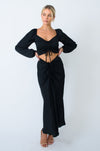 This is an image of Everly Blouse in Black - RESA featuring a model wearing the dress