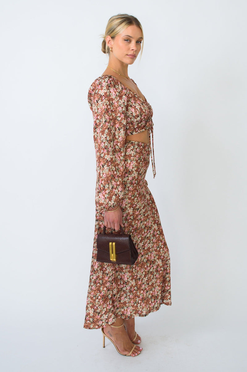This is an image of Everly Blouse in Brixton - RESA featuring a model wearing the dress