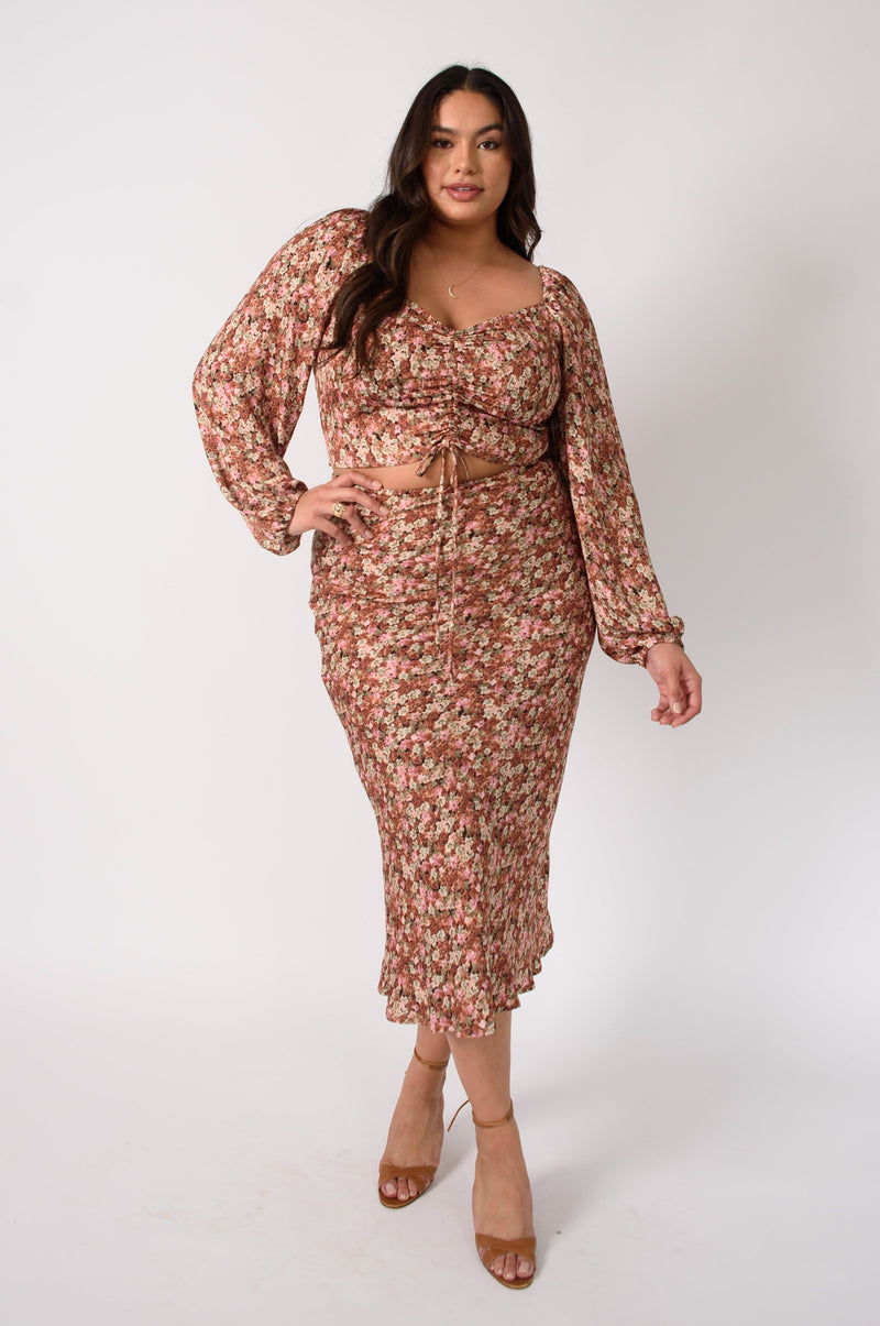 This is an image of Everly Blouse in Brixton - RESA featuring a model wearing the dress