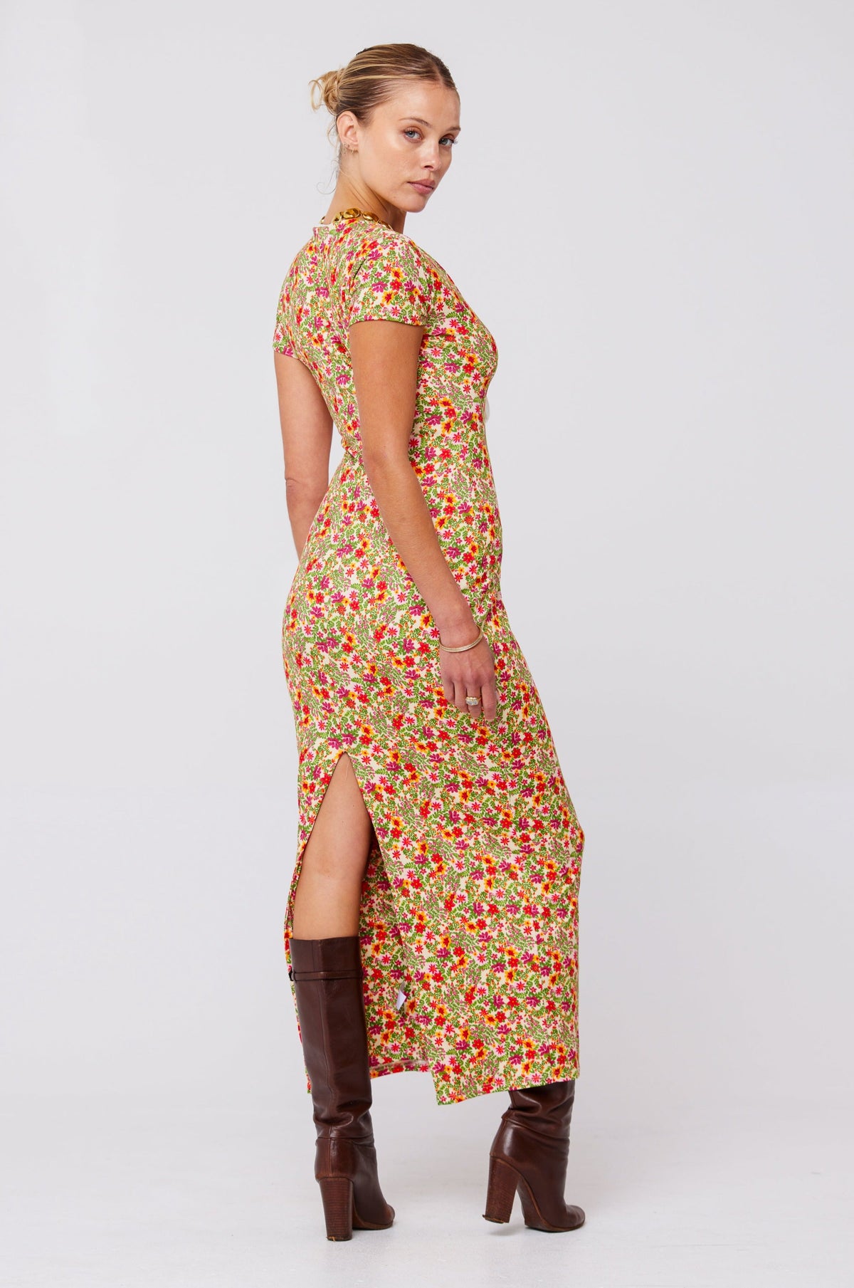 This is an image of Farrah Dress in Fleetwood - RESA featuring a model wearing the dress