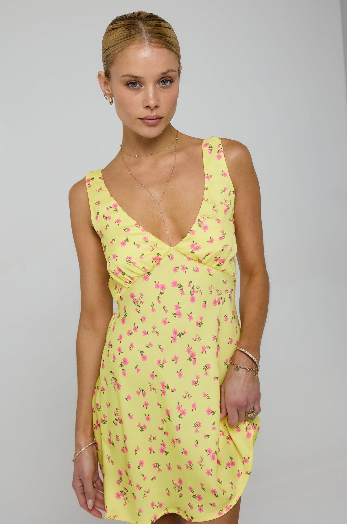 This is an image of Frankie Mini in Honey - RESA featuring a model wearing the dress