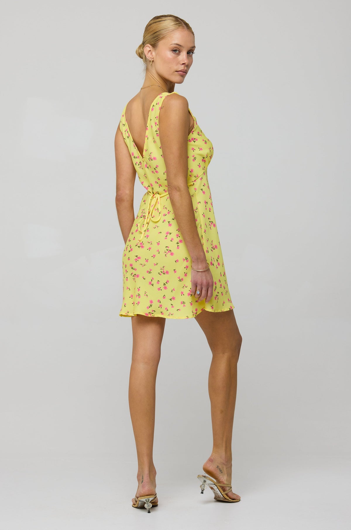 This is an image of Frankie Mini in Honey - RESA featuring a model wearing the dress
