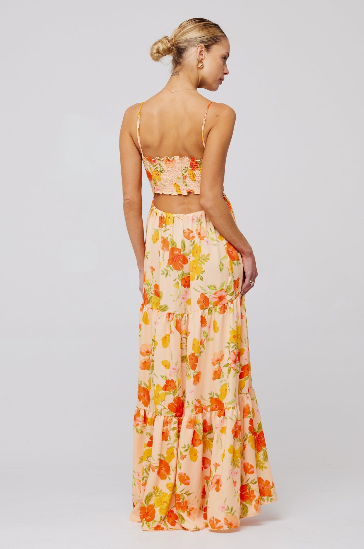 This is an image of Gabi Maxi in Ginger - RESA featuring a model wearing the dress