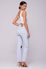 This is an image of Gigi Corset in White - RESA featuring a model wearing the dress