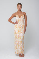 This is an image of Grace Dress in Gardenia - RESA featuring a model wearing the dress