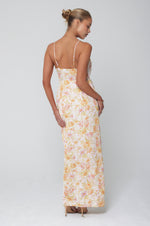 This is an image of Grace Dress in Gardenia - RESA featuring a model wearing the dress