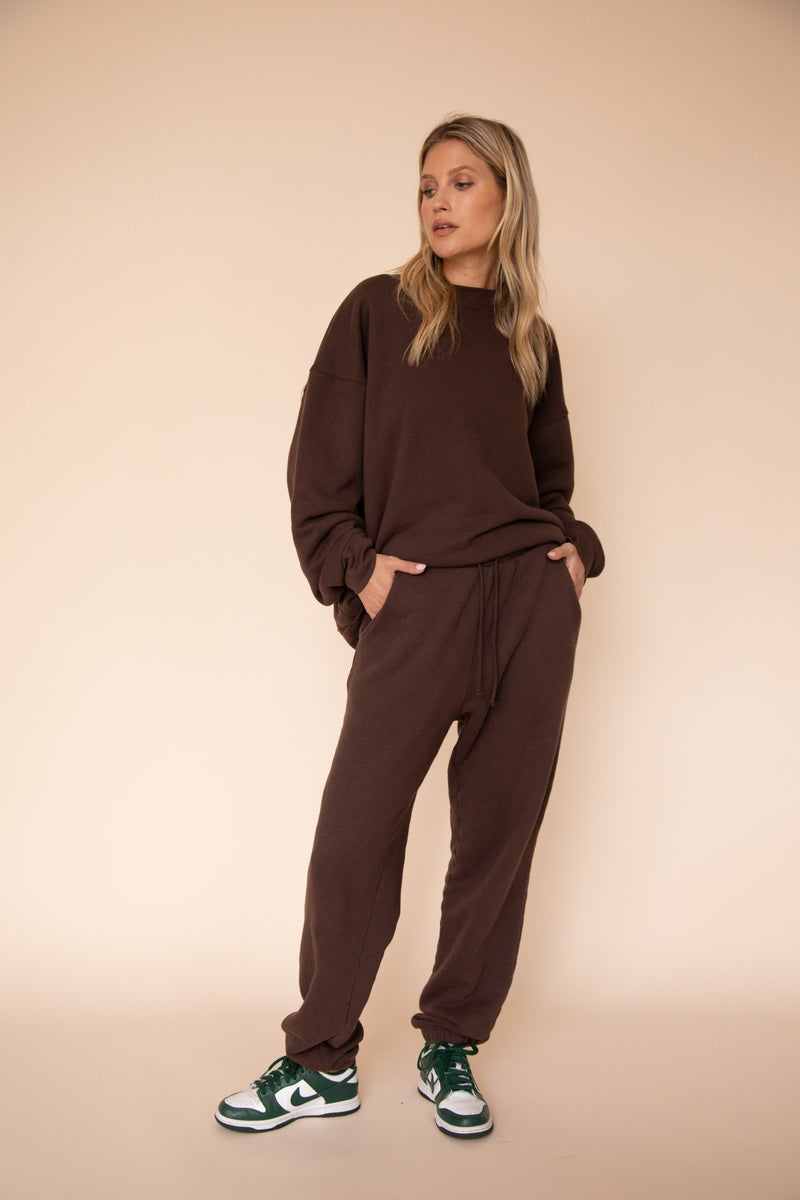 This is an image of Gunner Sweatshirt in Tobacco - RESA featuring a model wearing the dress
