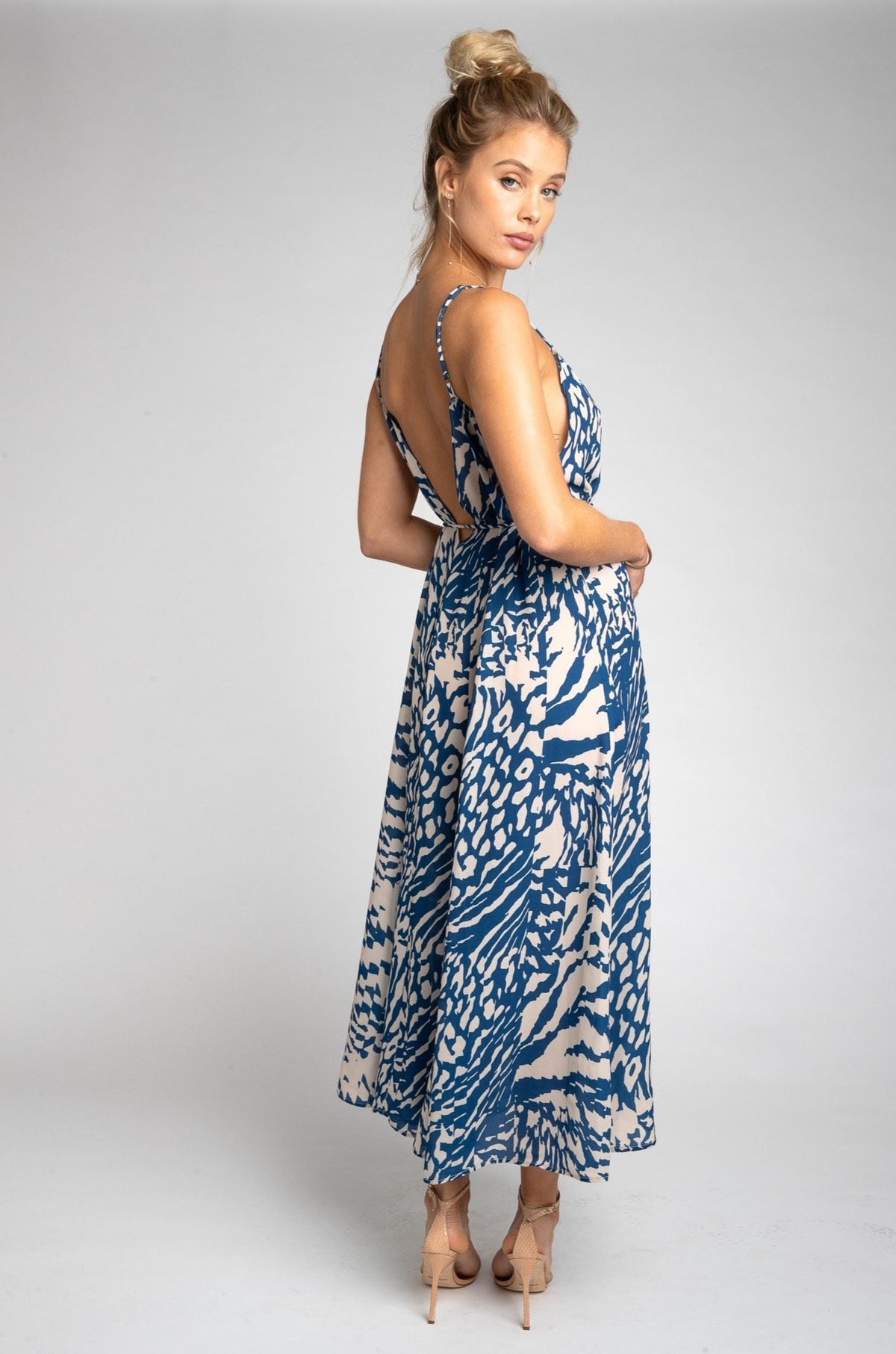 This is an image of Hannah Midi - RESA featuring a model wearing the dress