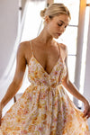 This is an image of Hannah Midi in Gardenia - RESA featuring a model wearing the dress