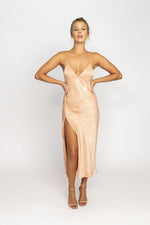 This is an image of Harper Midi - RESA featuring a model wearing the dress